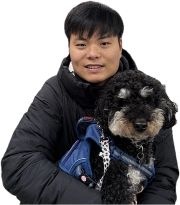 say local founder Eungi Lee holding a dog